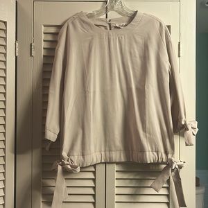 Cream colored blouse with ties